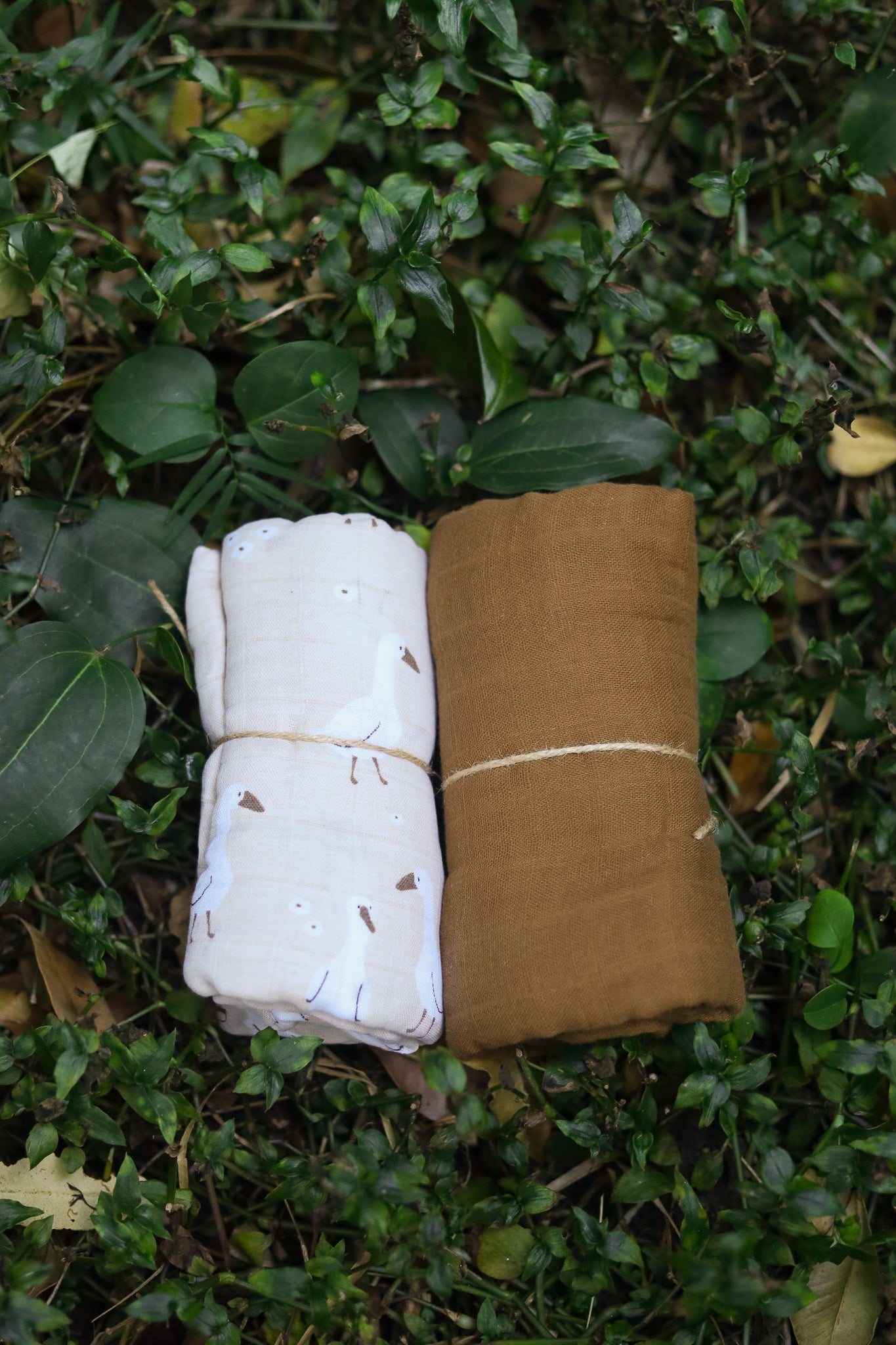 2 XL muslin swaddle cloths made from Bamboo and Cotton. One cloth is Earthy brown colour and other cloth is goose print (110cm x 120cm)