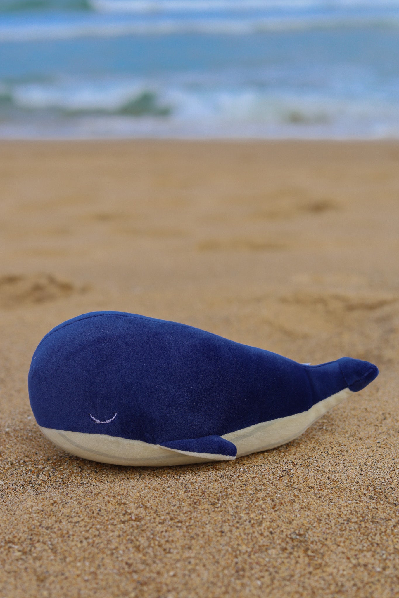 Cute soft toy blue whale for newborn baby as part of 3-tier Charming Sea nappy cake